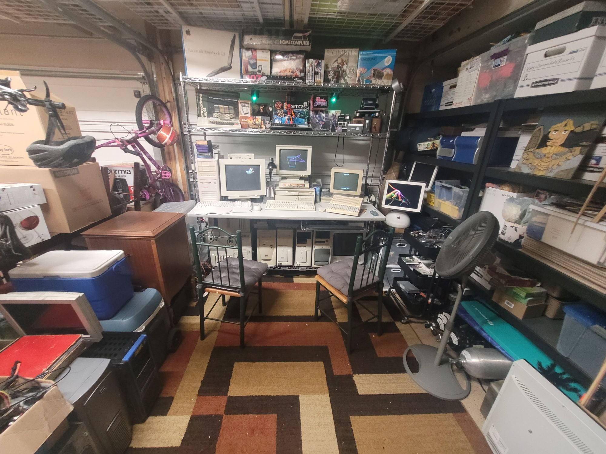 Room full of old vintage computers with an Intel 486, Apple IIc, IBM computers, and more collectable computers from the 90s and 80s